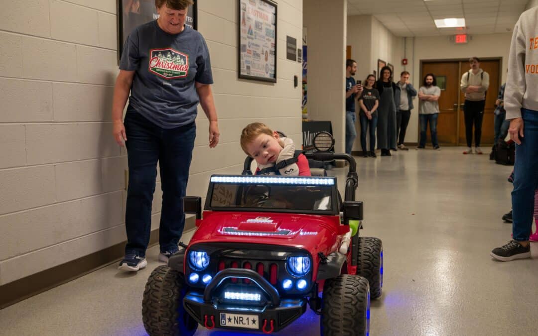 Go Baby Go: Milligan engineering modifies toy cars to help local children  play