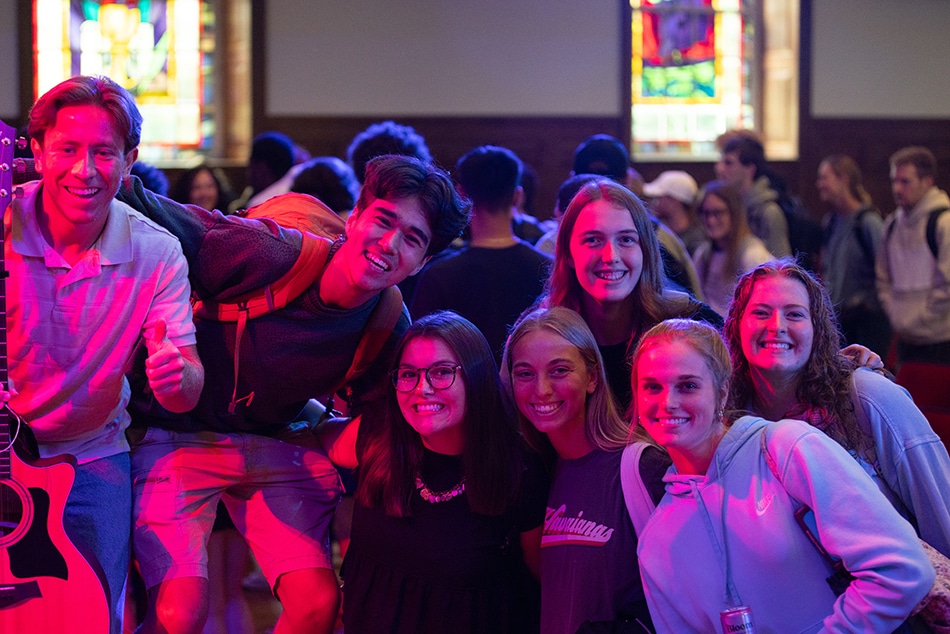 students pose for a photo after chapel in Seeger Memorial Chapel