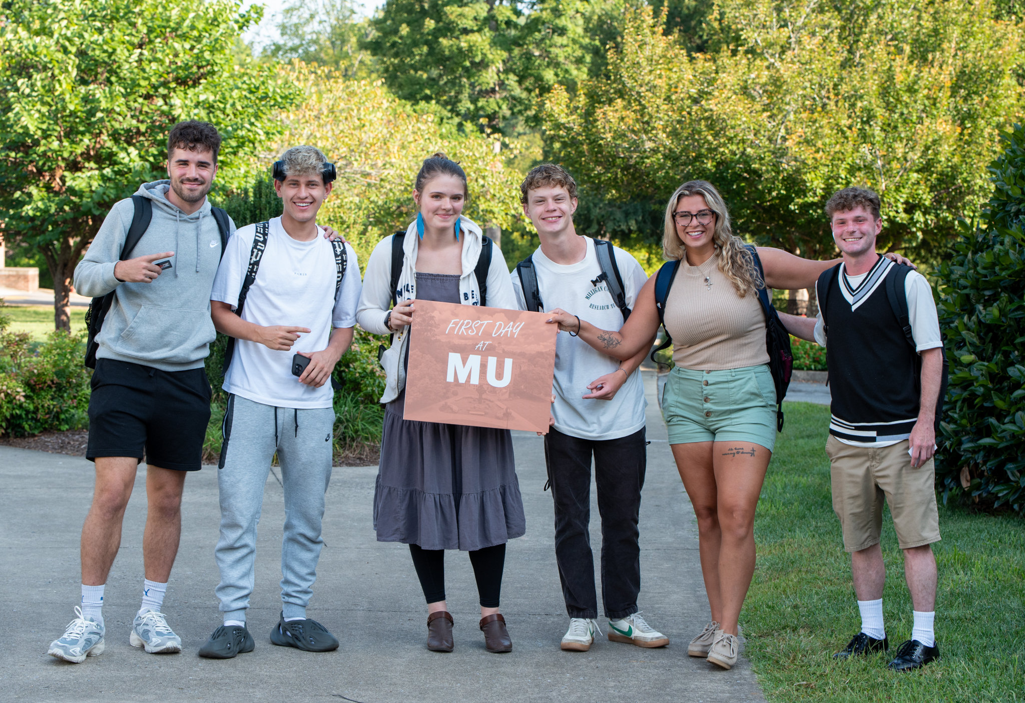 students pose for a photo on the Commons during the first day of classes