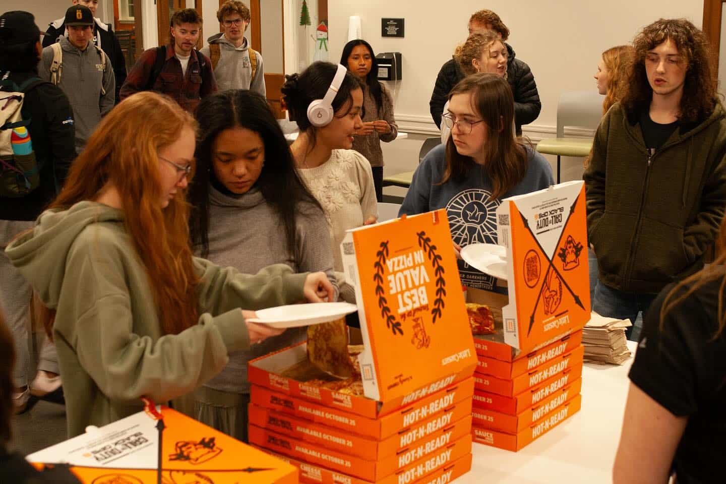 students enjoy pizza during midterms